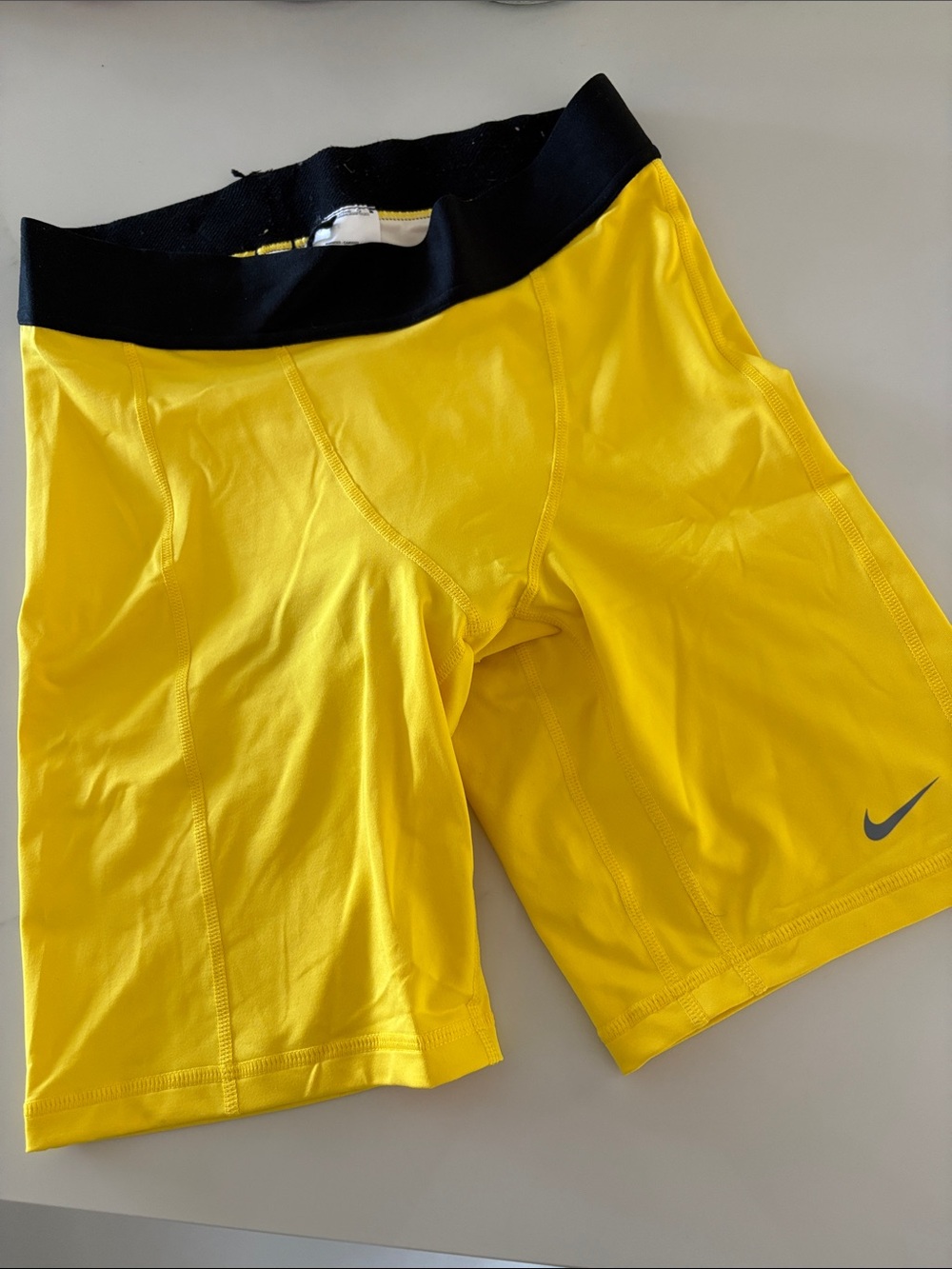 Nike Yellow Athletic Compression Shorts with Black Waistband